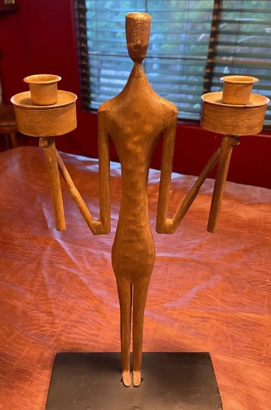 Metal man abstract modern statue with candleholders
